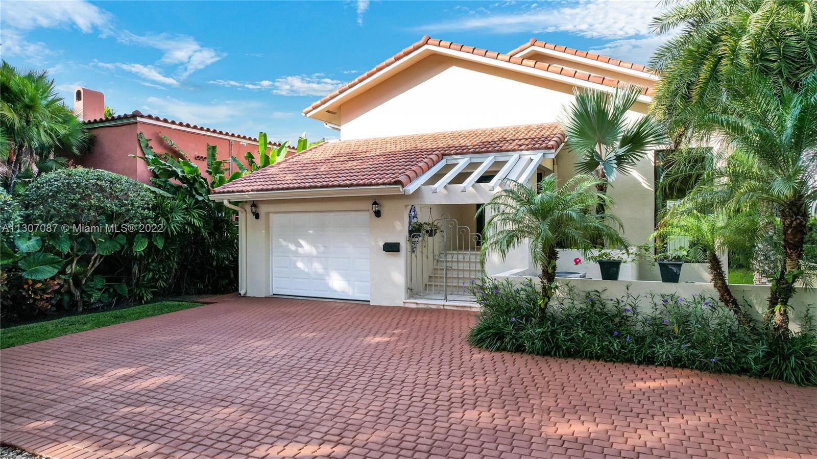 This 2-story Mediterranean-style home is located on one of the best tree-lined streets in Coral Gables and offers 4BR/4BA with 3,746 total SF. An elegant foyer opens to a dramatic living room with soaring ceilings, and formal dining room. Spacious kitchen with center island sports top-of-the-line appliances, granite countertops, an adjacent family room, plus billiard room with built-in bar. There is a bedroom downstairs and 3 bedrooms upstairs. The 2nd floor primary suite features a sitting area, ample walk-in closet & marble bathroom with separate tub and shower. Interior highlights include fine marble floors, and vaulted wood beam ceilings. Outdoor highlights include a covered terrace, large pool & spa ideal to relax and entertain. Located just minutes to Miracle Mile, Coconut Grove,