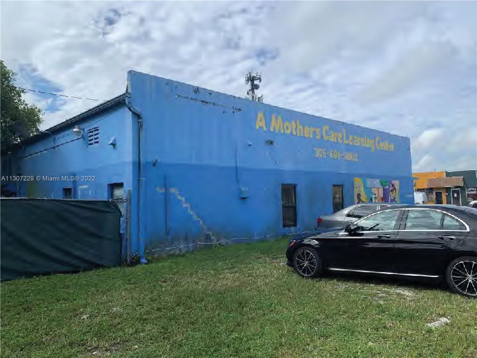 Primary building from the North Side.  This grassy parcel on the North side is owned by City of Miami.