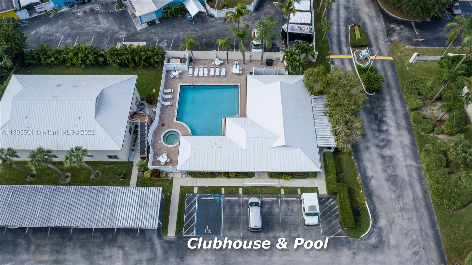 Aerial view of the clubhouse and pool.