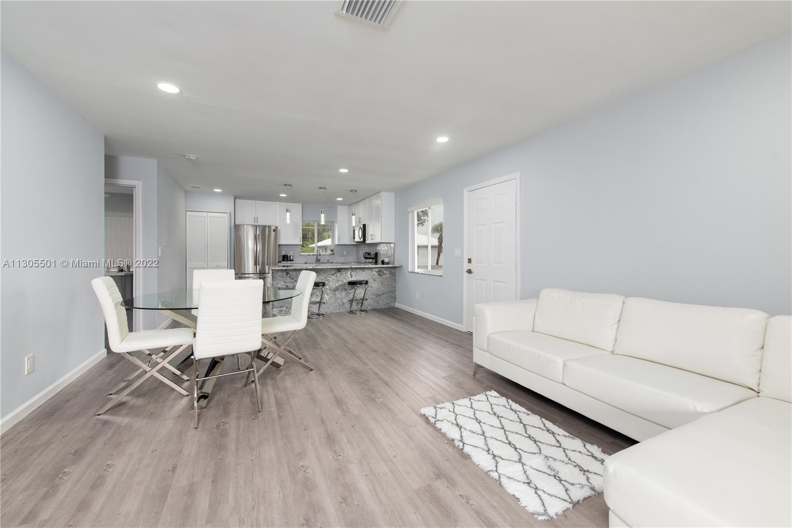 View towards the kitchen from the living room space.