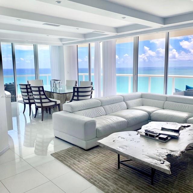 CONDO IN THE CLOUDS" located in the highly sought after AKOYA Luxury Condo in Miami Beach 38 floors high into the clouds. Ocean front WRAP AROUND BALCONY with PANORAMIC views overlooking beautiful MIAMI BEACH crystal blue waters. Fully furnished by AWARD WINNING designs of ARTEFACTO. Over 1700 sqft of pure luxury, THASSO marble floors. Every room has absolutely spectacular oceanfront views. Originally a 3 bed 2.5 bath converted into 2 full master bedrooms with 2 full bathrooms and a half bath, 2 parking spaces conveniently located next to building entry door. Fingerprint building access. Amenities include, sauna, racquetball, tennis, golf, 24hr concierge, pool, direct beach access, BBQ and much more. This is a luxurious dream vacation home in the clouds. *RATES MAY VARY* Seasonal Rental.