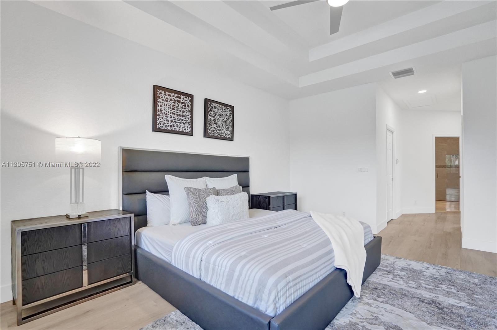 Master suite has two large walk-in closets and leads to upgraded master bathroom.