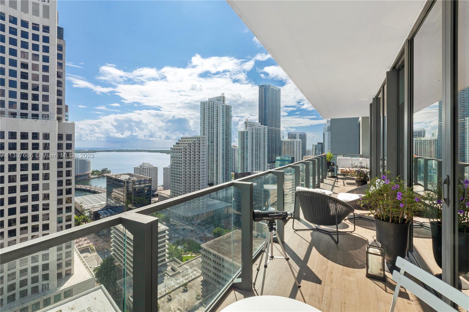 Best line at Reach at Brickell City Centre! Stunning panoramic water and city views from this spacious 3bed/ 3+1/2 bath + dining area + DEN. Unit has a large balcony to enjoy the Brickell skyline! Top-of-the-line white lacquer cabinetry, Quartz stone countertops w/ premium Bosch appliances, Himalaya Gray marble flooring throughout. Reach Condo offers its residents a full-time concierge, gym, Spa, playground, screening room & ultra-luxury services. Enjoy BCC's high fashion shops, fun and delicious eateries & more! Fully equipped w/ custom closets and window shades. Unfurnished unit.