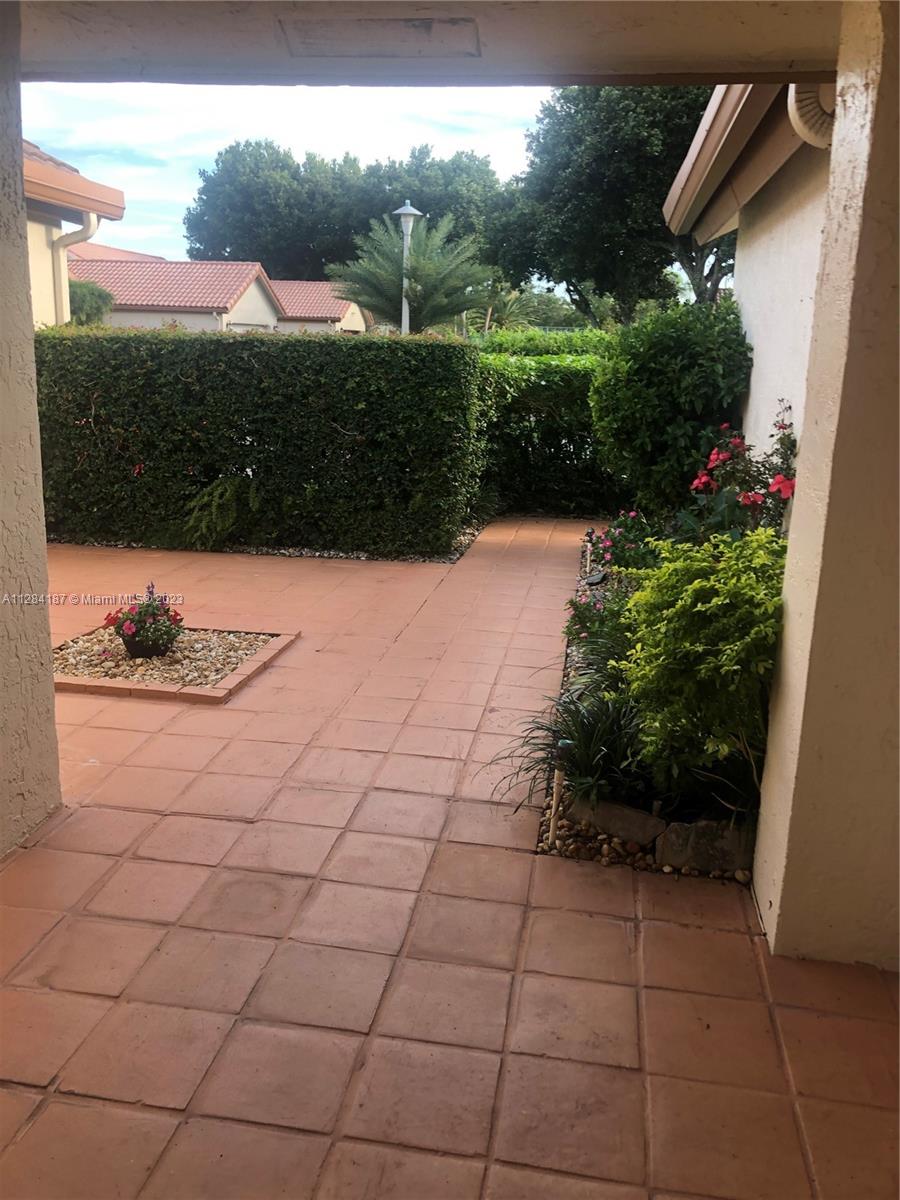 Private Landscaped Entry Courtyard