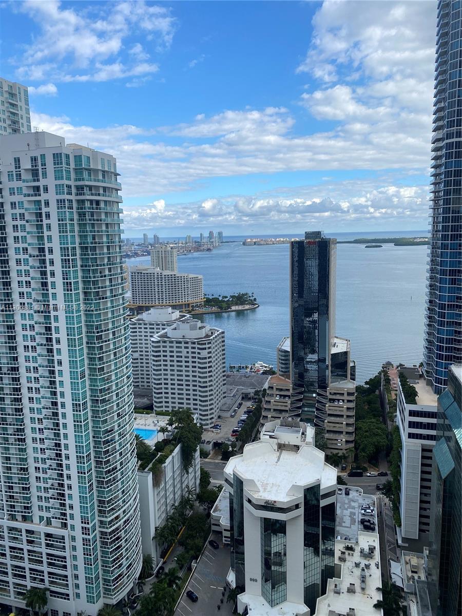 Spectacular high floor, bay view,2 bed/3bath/den unit at desirable 1010 Brickell with wood looking tile throughout ,stainless steel appliances, large balcony, private elevator .includes amenities such as: Hammam Spa with Steam Room, Sauna, Jacuzzi and Cold Plunge, massage room, indoor heated pool, rooftop pool, bar/restaurant, outdoor theater, sunset rooftop jacuzzi, Fitness Center with Peloton Bikes, playroom, arcade room, squash, basketball, bocce, exercise trail, kids bowling alley, ping-pong, golf simulator, air hockey and more.Steps from Brickell City Centre, and the hottest restaurants. Six months rental