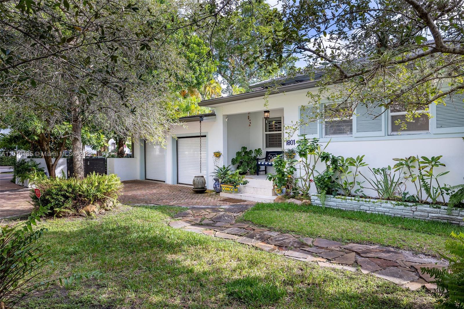 Come and see this beautiful and centrally located home in the tranquil neighborhood of "North" Coral Gables. This unique 2,040 sqft home has it all. It features 3Bedrooms and 3Bathrooms, an entertainment room, an updated kitchen, and a beautiful pool to enjoy all year. Walk into the ample living room/dining area with plenty of natural light and high ceilings. Other updates include a new roof with solar panels, stainless steel appliances, impact windows/doors throughout, wood floors, and more. This house is move-in ready. Make an appointment today. It will not last.