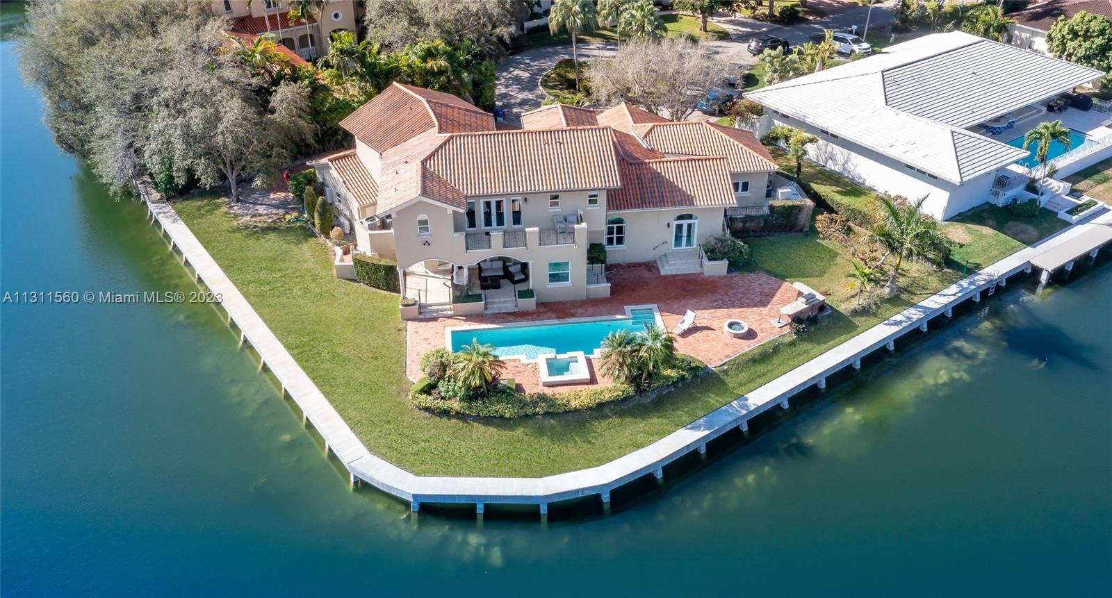 Mediterranean style 5 bed Villa at prestigious gated community "Gables by the Sea in Coral Gables -Pinecrest. Unique corner home with 240 linear ft 3/4 of wrap around water frontage. Enjoy magnificent water views on peaceful cul-de-sac. Two Floors with high ceilings overlooking the interior patio gardening. The family room opens to covered terrace. kitchen dinning with views of the water.  Adition was made by previous owner, in laws quarters with its own entrance and direct access to the pool- barbecue area.Private balcony in master bedroom on second floor. 3 car garage with electric car charger and great tools cabinets and fridge. Best Public and private schools within 10 min drive Pinecrest Elementary, Palmetto Middle &  Senior High. By Pinecrest Gardens Matheson Hammocks, 20 min to MIA.