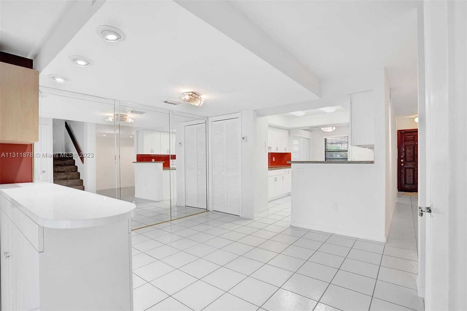 Kitchen opens to a formal dining room