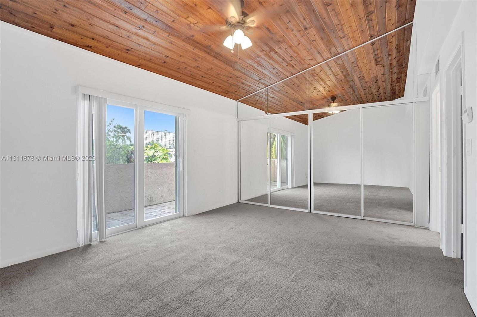 Large Master Bedroom with Vaulted Ceilings