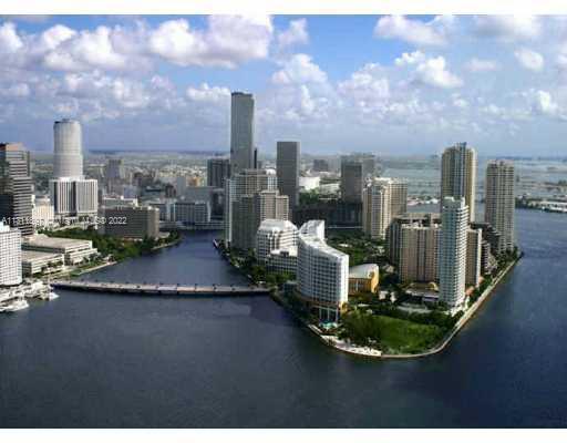 Enjoy bay and city views from this beautiful condo in prestigious Brickell Key II. It offers 2/2 split plan with two walk in closets, two balconies, one to bay and pool, the other to city and tennis courts. Tile in the living room, and carpet in the bedrooms. Building was recently renovated with new lobby, pool, gym. More amenities include convenience store, valet, security, sauna, pool table, racquetball. Excellent location!