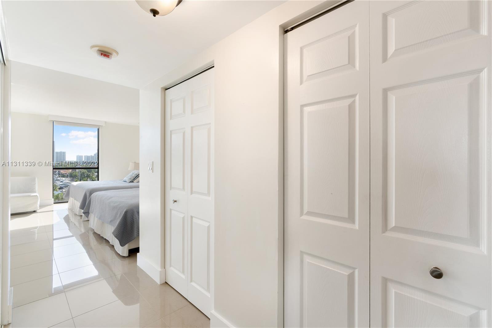 entrance to the master bedroom with a large closet space