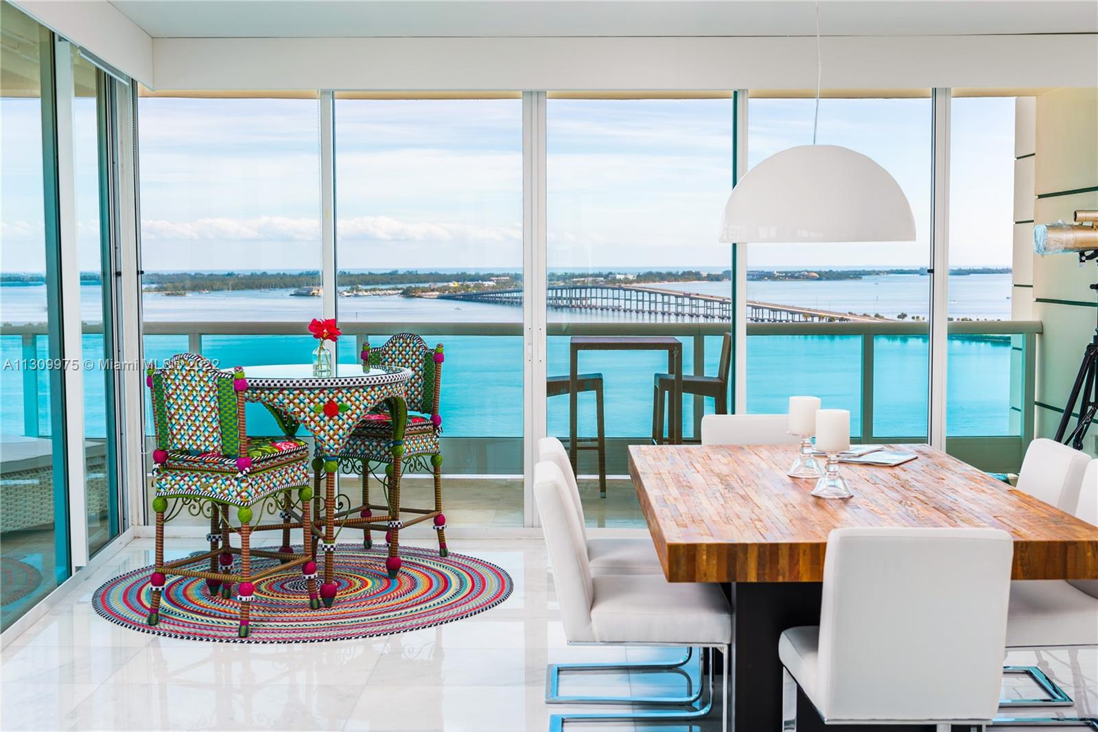 Located on Brickell's green mile, this property at BRISTOL TOWER is a unique find. Private entrance lead to striking water views. COMPLETE updated unit 2 Bd, 2.5 Bth, separate laundry area, 2,070 sq ft L.A.. Light & bright gourmet kitchen. Wraparound balcony showcases an open air entertaining space with panoramic views of Key Biscayne Bay and Downtown Brickell.  Located near to I95 access, minutes from downtown financial, and direct access  to Key Biscayne Causeway.  Features include, marble floors, italian kitchen cabinets, Crestron, Wolf, Subzero, Electrolux washer/dryer and much more!