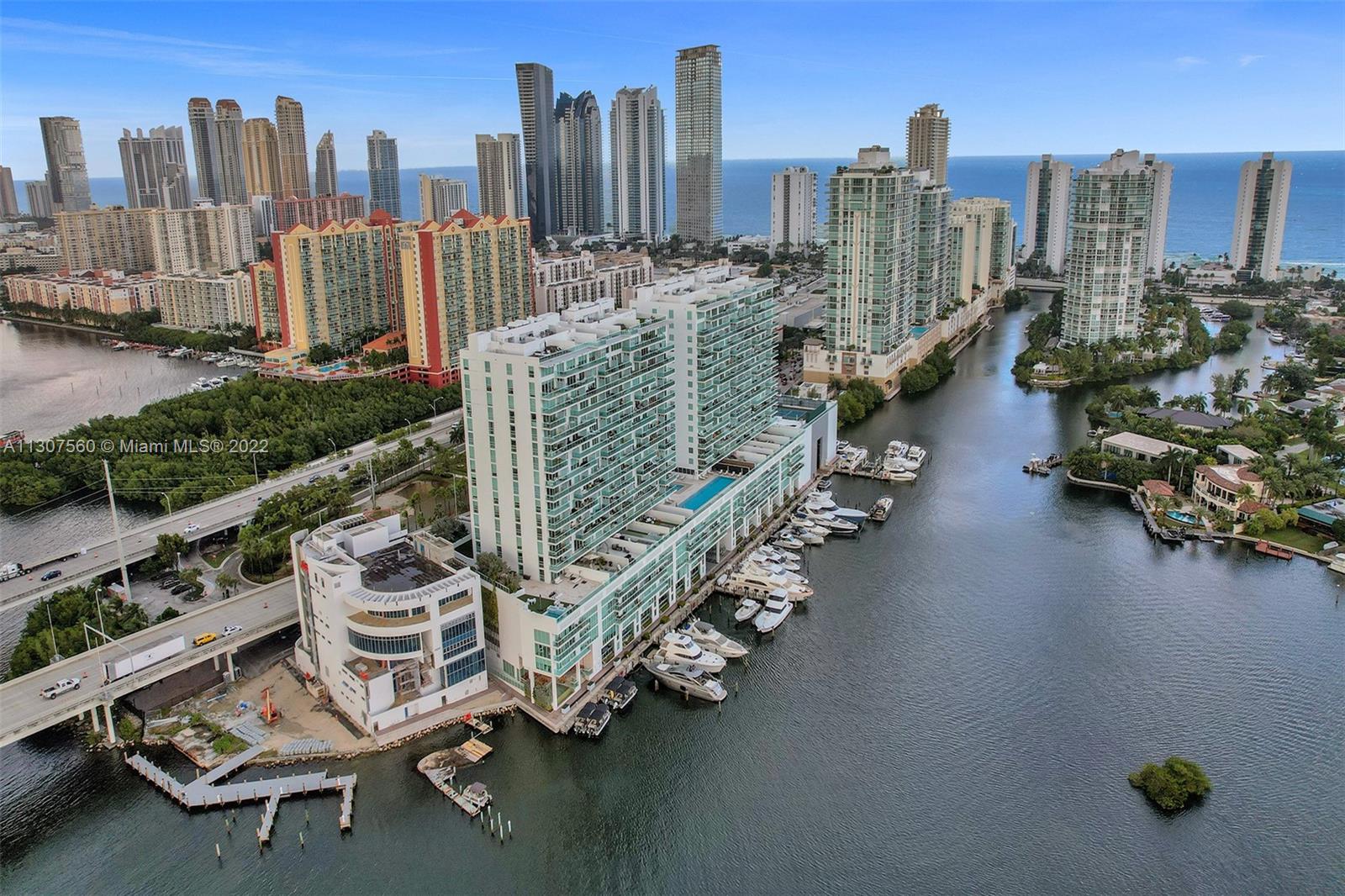 Breathtaking Million Dollar views from all rooms over Intracoastal, Oleta River Park, and Ocean. 1690 SqFt Luxury 2-story condo w/ UNIQUE Master bedroom on 2nd floor.  Features 2 bedrooms + 1 Den, 3 bathrooms, modern kitchen, and large open ceiling balcony with non-obstructed panoramic view. Resort Style Amenities such as Infinity Lap pool, Giant Jacuzzi, Spa, Fitness Center, Pool Bar, Steam Room, Meditation Garden, Mediterranean Restaurant, and Tennis Court. Amenities on the 6th floor with a view over the Bay and out to Ocean. Val.Park/24 hr security. Boater’s paradise with an independent wet Marina with Dry Dock Storage. Close to Bal Harbor and world renowned Aventura Mall shopping and walking distance to amazing restaurants, shops and nature Life at Oleta River Park.