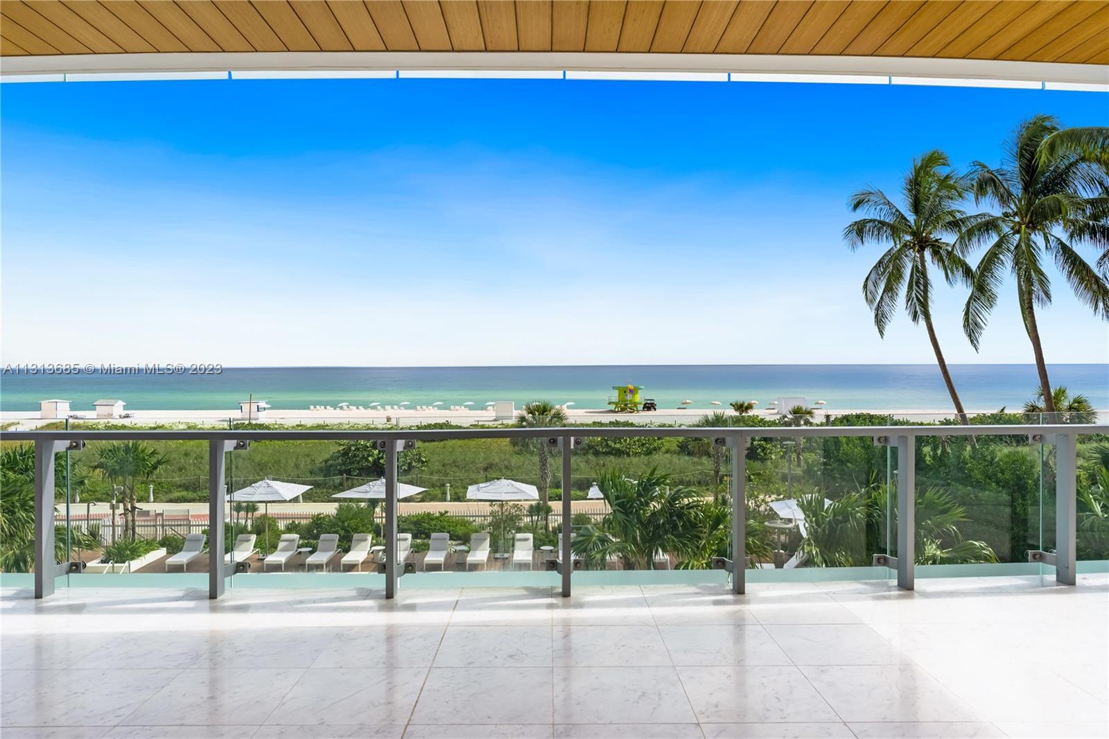 Experience Miami Beach's finest oceanfront living at 57 Ocean, Beach House 1. Sited on the East-South-West corner of this 2021-built condo, this exquisitely finished residence has an excellent floor plan with 2,000-SF of wraparound terraces and squared patio equipped with summer kitchen. A beach lovers' dream home comprising 2,900-SF of luxury interiors finished with marble and wood floors, high ceilings, designer light fixtures, frameless and pocket doors, marble kitchen, and sliding doors that completely open for seamless indoor-outdoor connection - all surrounded with the Atlantic Ocean and swaying palm trees. Oceanfront master suite with 2 built-in closets and luxe bath, 3 guest beds with en-suite baths, walk-in pantry, 3 valet spaces. Indulge on lavish amenities on the beachfront!