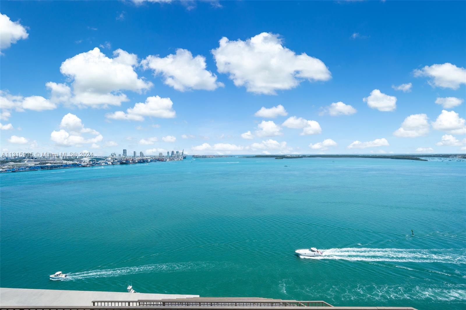 DIRECT OCEAN EAST FACING TOP FLOOR 2 STORY UPPER PENTHOUSE - Over 3,000 square foot interior plus massive wrap around balconies on each level - stunning open ocean and city views for miles from this direct east facing top of Brickell Key One residence. Private and serene, offering 20ft volume ceilings in the living area with 3 master suites - a full master and additional full bath downstairs plus 2 full master suites upstairs in a split plan with a second private entrance/exit. 2 AC zones, full size utility room. Amenities include tennis and squash courts, valet parking, billiard room, meeting spaces, fitness rooms, beautiful pool plus secured access to the Brickell Key walkway. Open bright and inviting with views for miles and virtually no neighbor. Call LA for a private showing.