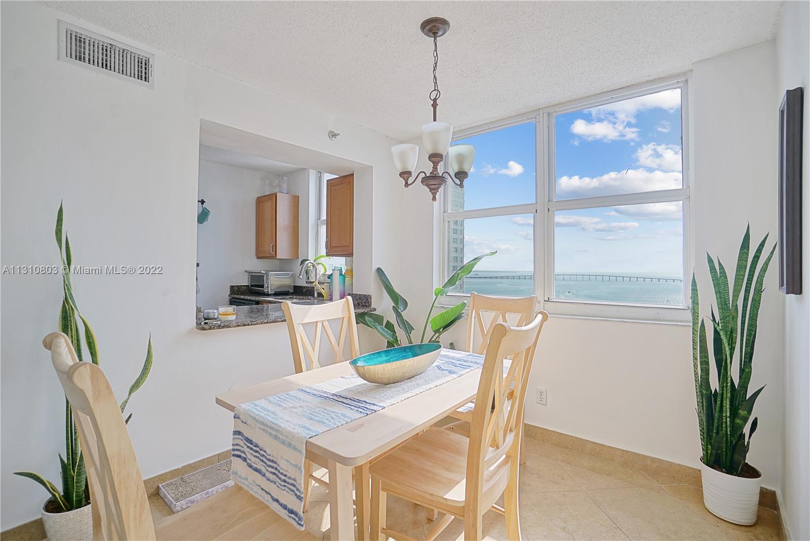 Dining area - kitchen both with gorgeous intracostal views