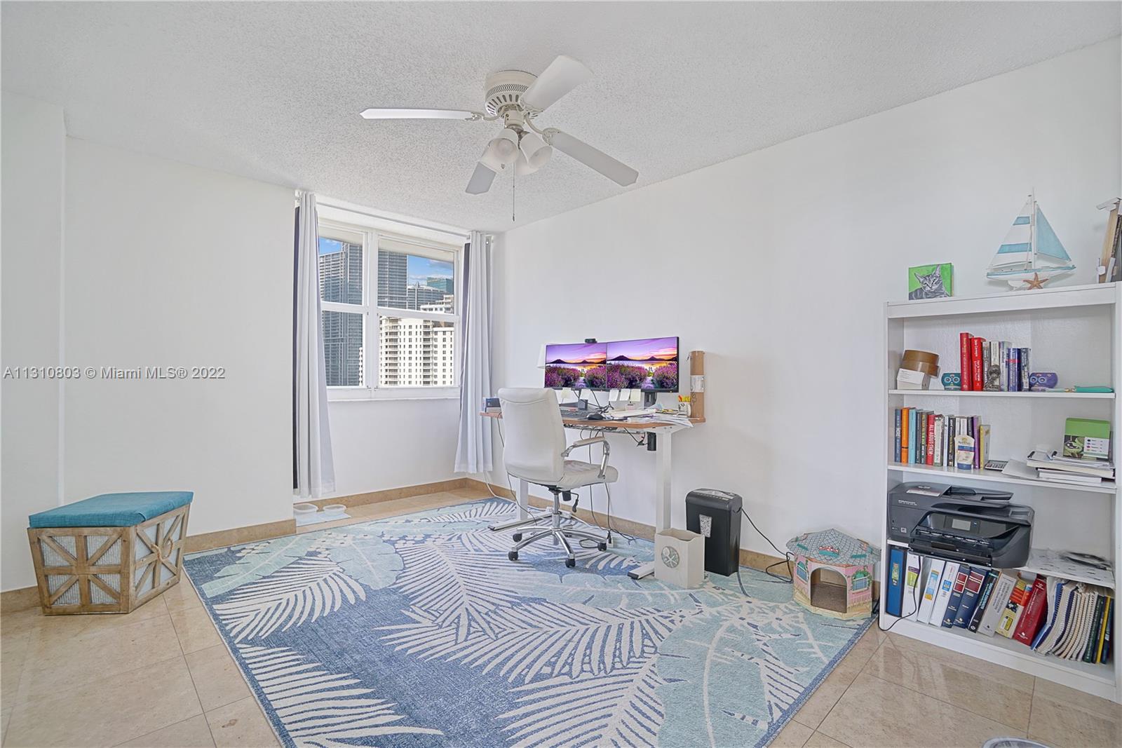 Bedroom 2 with Brickell Skyline view and walk-in closet