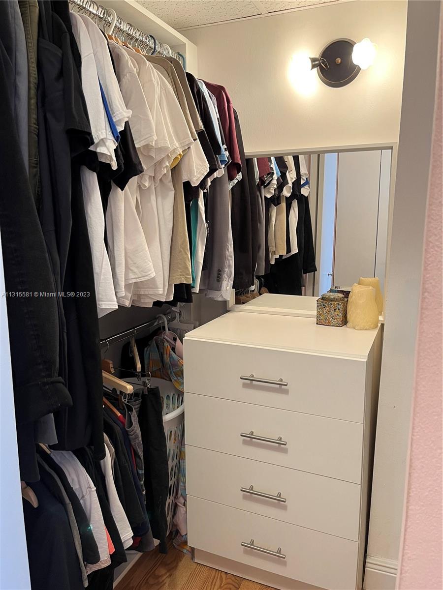 One of the 2-Master Bedroom Walk-In Closets