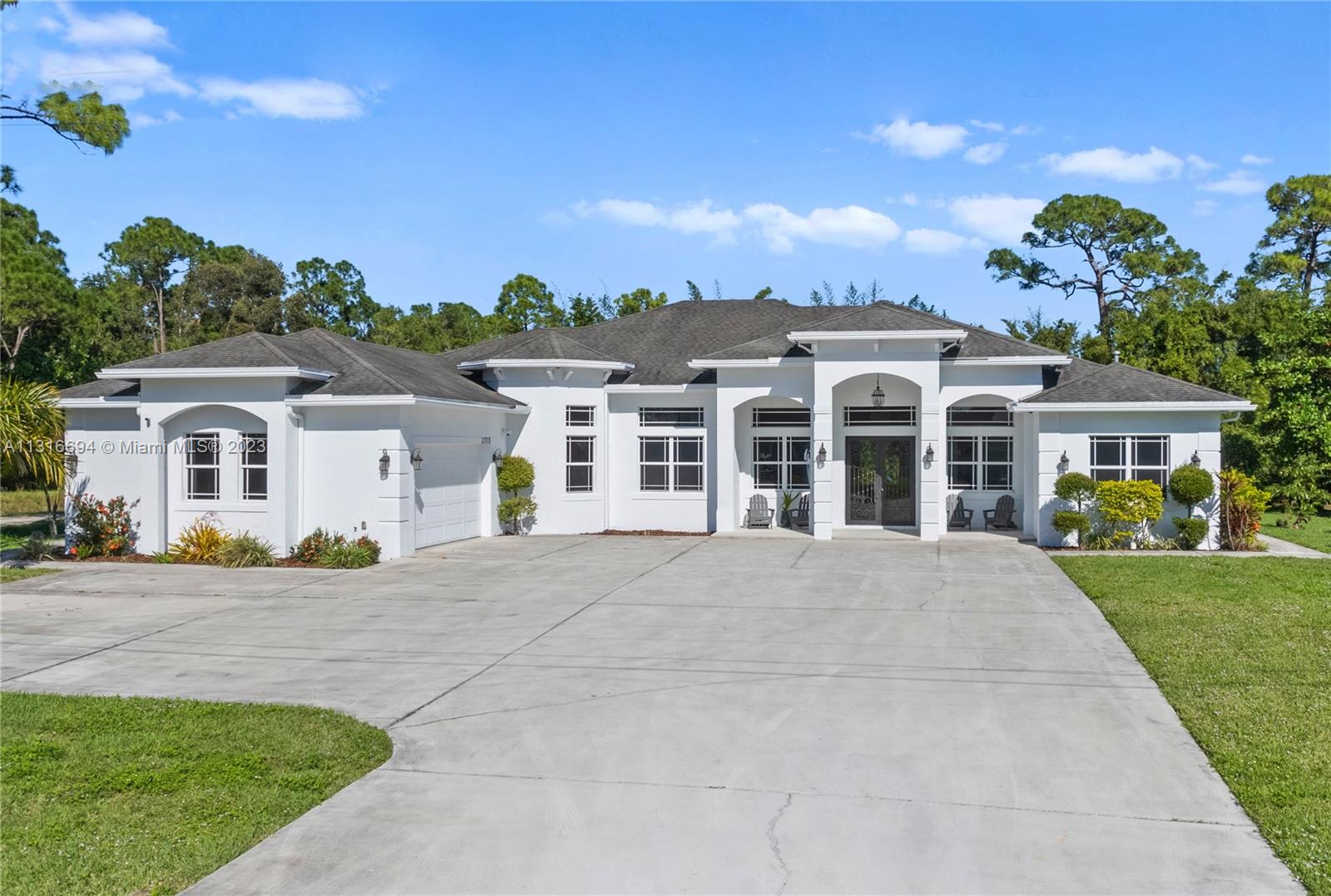 Welcome home to this exquisite resort-style living experience in this lush 1.3 acres of landscaped paradise, full of mature fruit trees in a peaceful and quiet location.