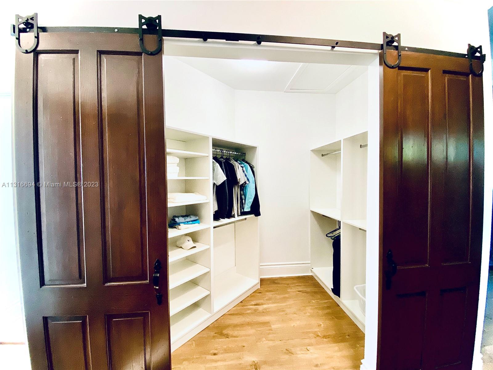 Closet 2 with lots of space to hang shorter items such as shirts and pants