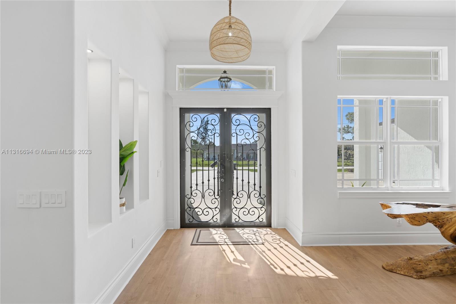Finest details such as these custom-made wrought iron doors.