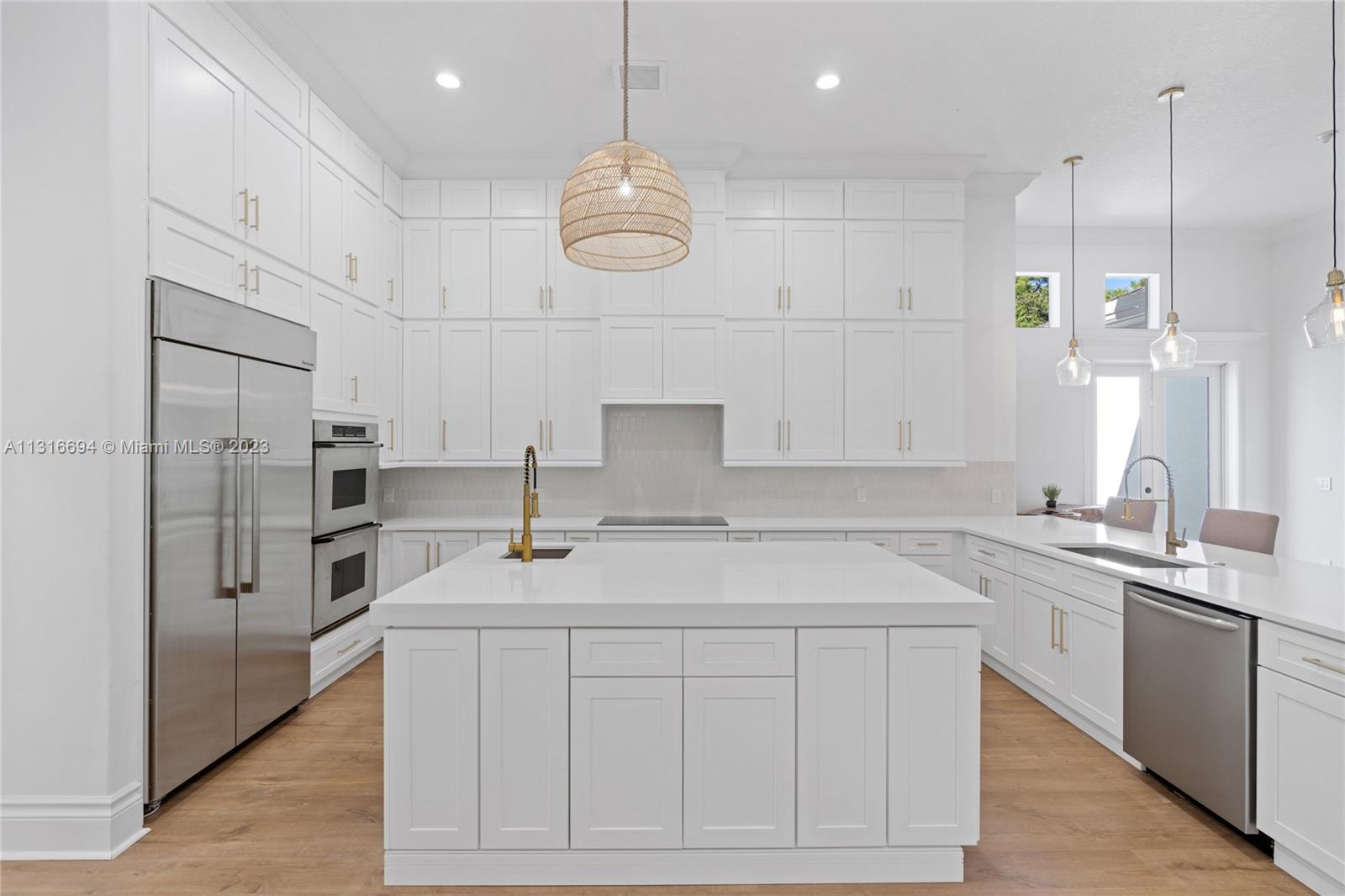 Feel the pride in entertaining in your elegant gourmet kitchen, truly the heart of your home, adjoining the living room, the dining room, and the family room.