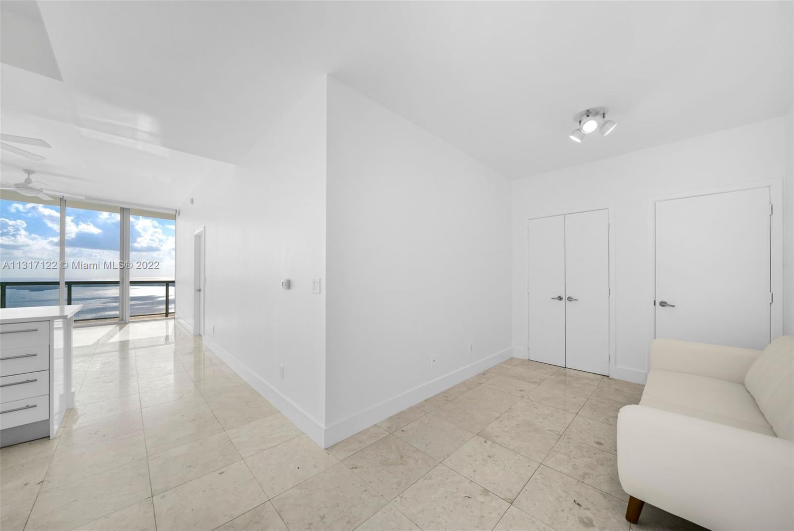 Large & spacious 1-bedroom + Den in the middle of downtown Miami. Enjoy picturesque views from every room with endless ocean & bay views, along with city lights that add a dynamic touch in the night. The condo has been partially updated with a new quartz kitchen counter, along with modern light fixtures and fans installed throughout. Situated next to all of the major highways for easy access, with walking distance to a green park, major entertainment centers and new restaurants & shops that are currently being built just right behind the building. This condo also offers 24/7 security, sunrise & sunset pools, fully equipped gym, Jacuzzi & BBQ area, a volleyball court and more.