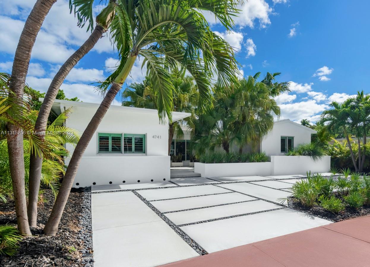 Stunning newly renovated mid-century modern home with a spacious sun-filled floor plan. The open living space leads to a fully covered lanai for entertaining, relaxing hedged backyard and large heated pool. Updated finishes in all bathrooms and kitchen with KitchenAid chef's appliances, a luxurious master suite with walk in closet and extensive storage space. Features include brand new roof, tankless water heater, impact glass windows and doors, Nest thermostats and in-ceiling Sonos sound system indoors and outdoors. Located in one of Miami Beach's most desirable Mid Beach neighborhoods just minutes away from the beach, nearby gyms, restaurants and retail in Sunset Harbour and within walking distance to houses of worship.