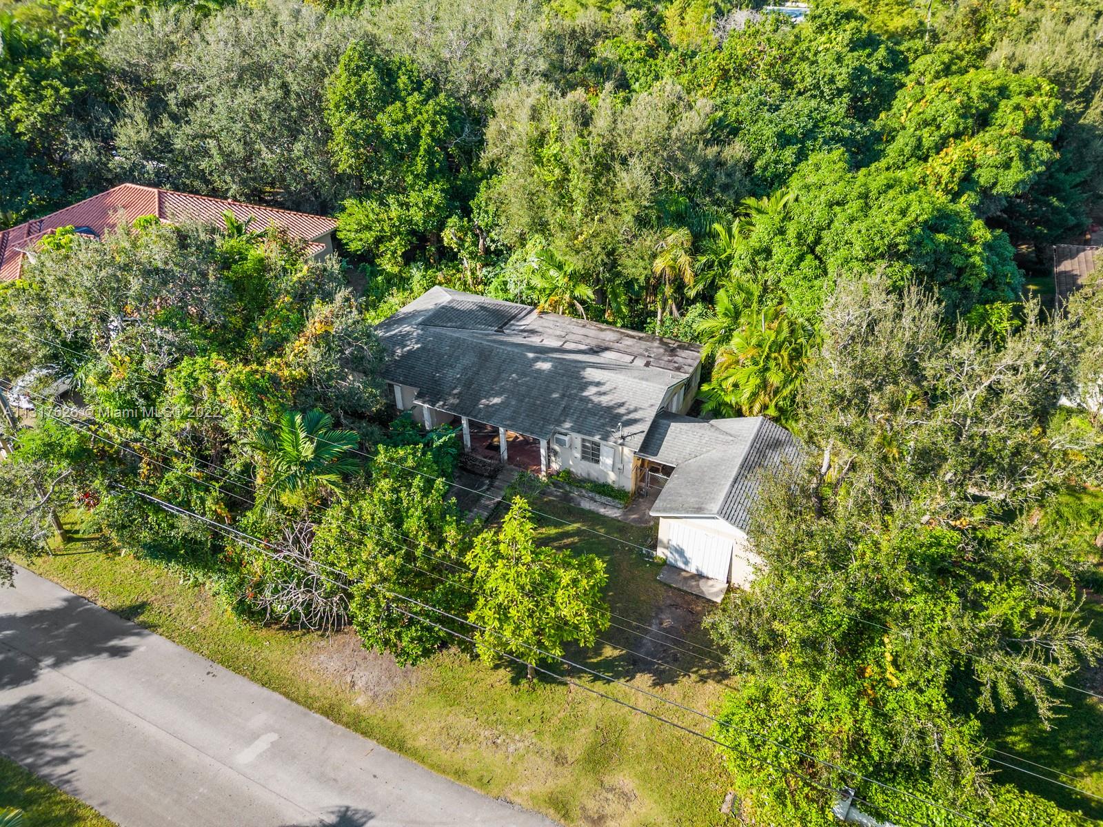 Large lot with lots of potential! Several single family homes being built in the area, close to shopping, parks and major highway.