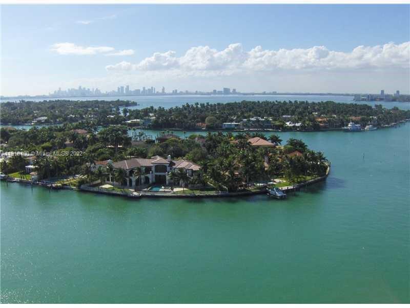 OPEN BALCONY OVERLOOKING ALLISON ISLE, LA GORCE ISLE & THE MIAMI SKYLINE