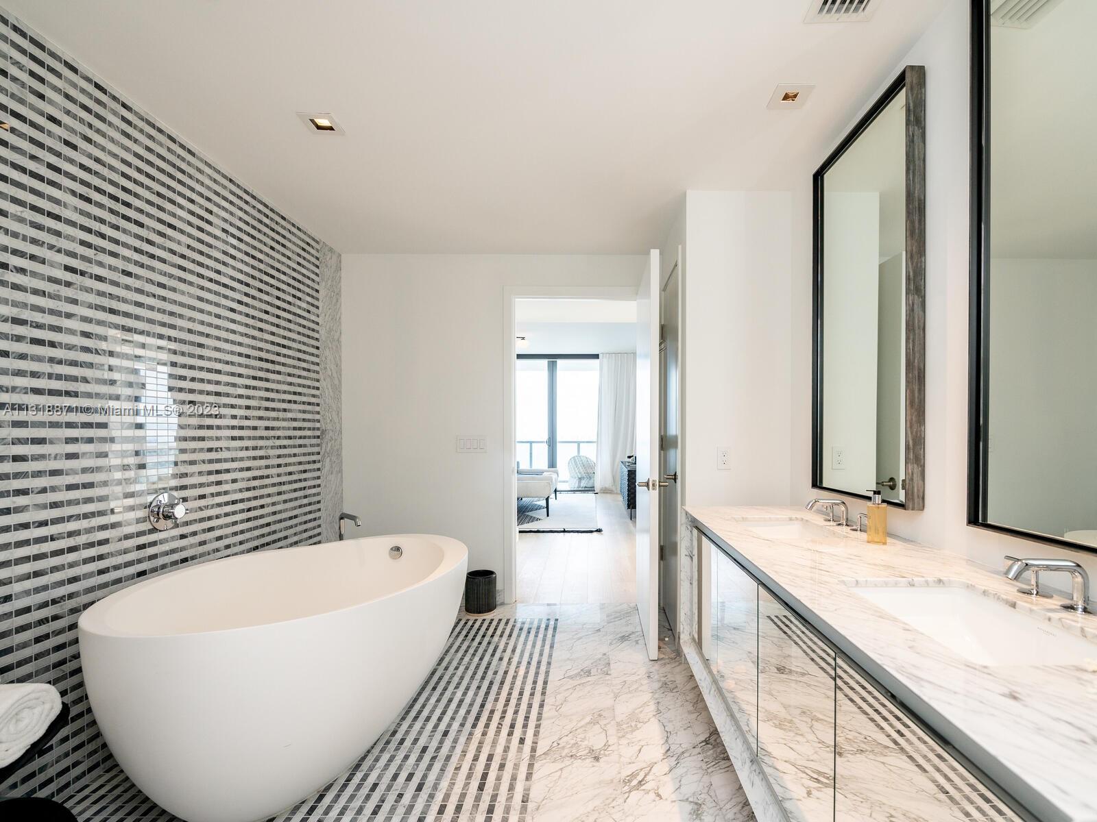 Primary Bath featuring Waterworks fixtures