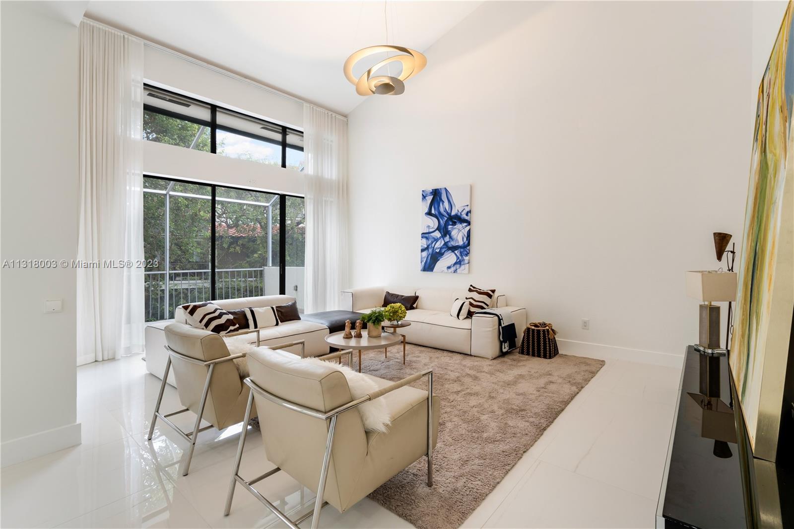 Love the tall ceilings and the amount of light coming through