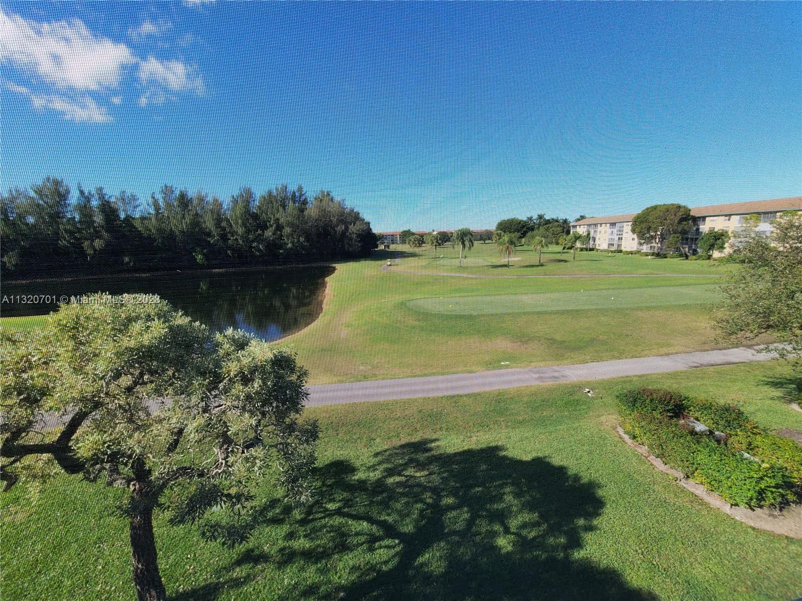 VIEW TO GOLF COURSE FROM BALCONY