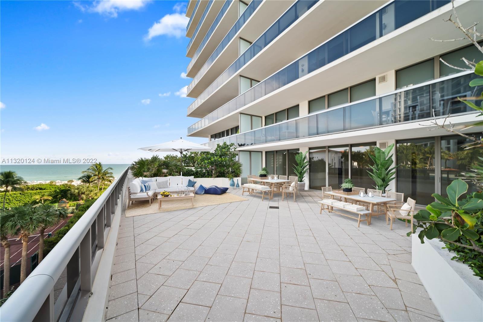 This stunning waterfront unit has floor to ceiling windows leading out onto a 1,000+ sf private terrace, filling the unit with natural light and making it feel very spacious. Enjoy 2 bedrooms, each with their own bathroom plus an additional half bathroom. The primary bedroom features a walk-in closet. The water heater was recently replaced with a tankless heater, opening up additional closet space. The unit has in-unit laundry tucked away in a discreet closet. The Mei has recently renovated to keep up with its superior standards. The building has a relaxed, zen feel and truly feels like you're at a 5-star resort. The gorgeous pool and garden area opens up onto the Miami Beach boardwalk, giving you direct beach access. Enjoy exceptional, beachfront resort living with a huge private terrace.