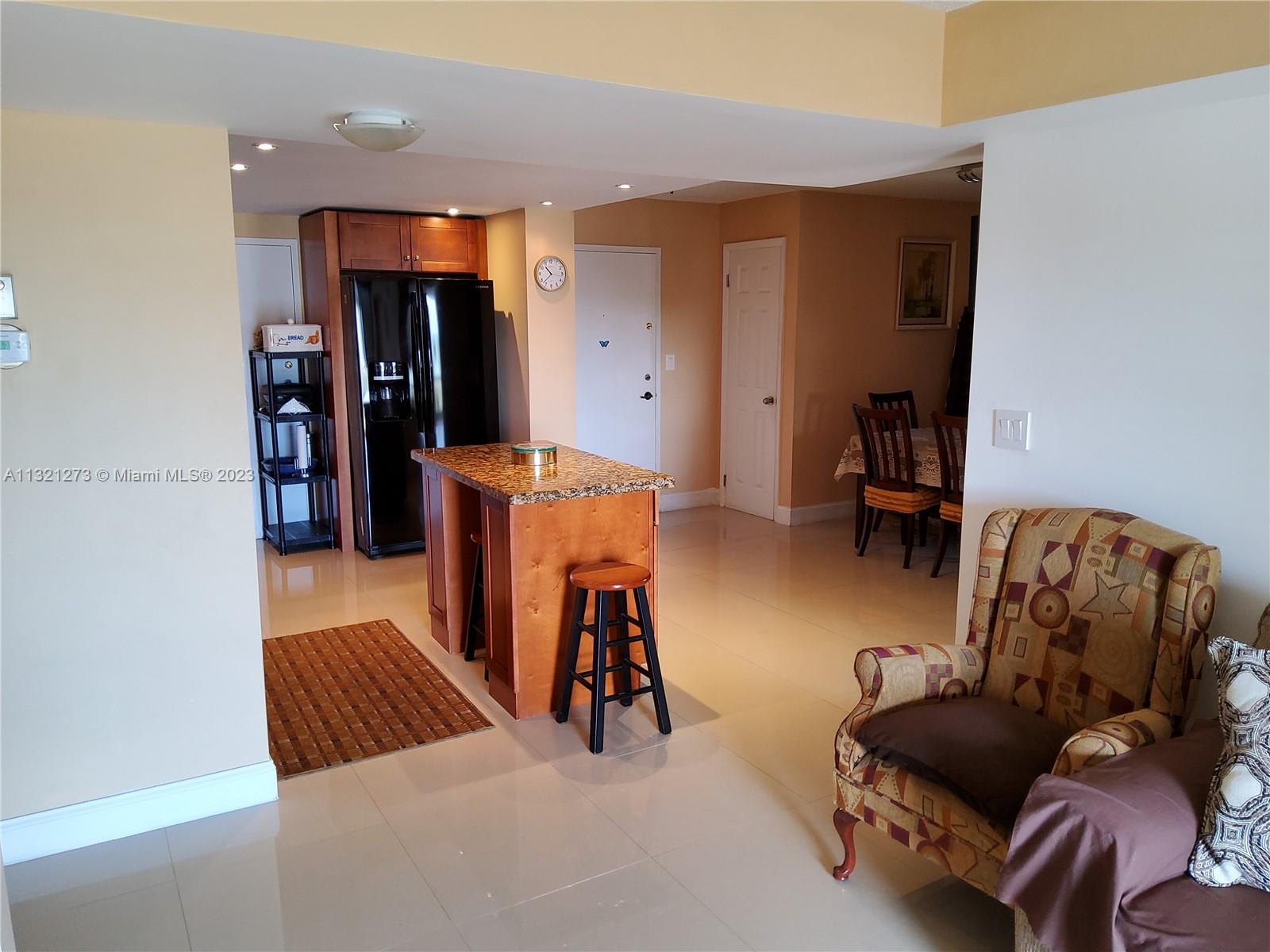 View from den area to kitchen