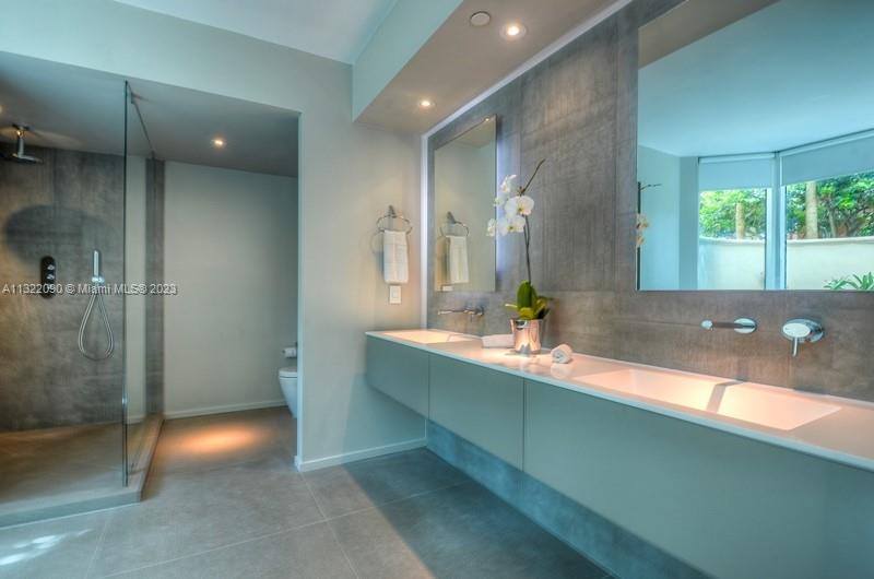 Huge master bath with double vanity sinks