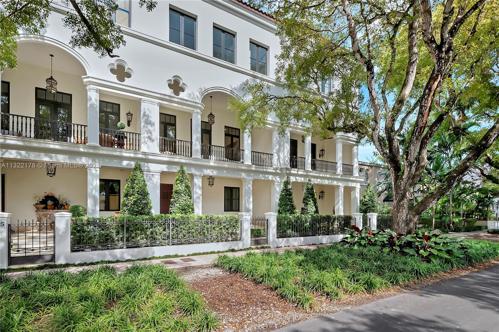 Althea Row is collection of 5 luxury townhomes in the heart of Coral Gables. This Spanish-Colonial style home is a timeless masterpiece where elegance and sophistication meet. This home consists of 4 beds/4.5 baths spread across 3 stories & 4,258 living SF and a total of 6,820 SF. Features include: abundance of natural light, 12-ft ceilings, Subzero & Wolf appliances, a Butler's pantry, herringbone wood floors, custom millwork, vaulted ceilings, walk-in closets, spiraling staircase, 4-car garage, & sliding doors that open up to a romantic private courtyard and loggia with a summer kitchen. Enjoy tranquil living in this residential neighborhood yet the convenience of living minutes away from Miracle Mile, Merrick Park, the Biltmore, & more.