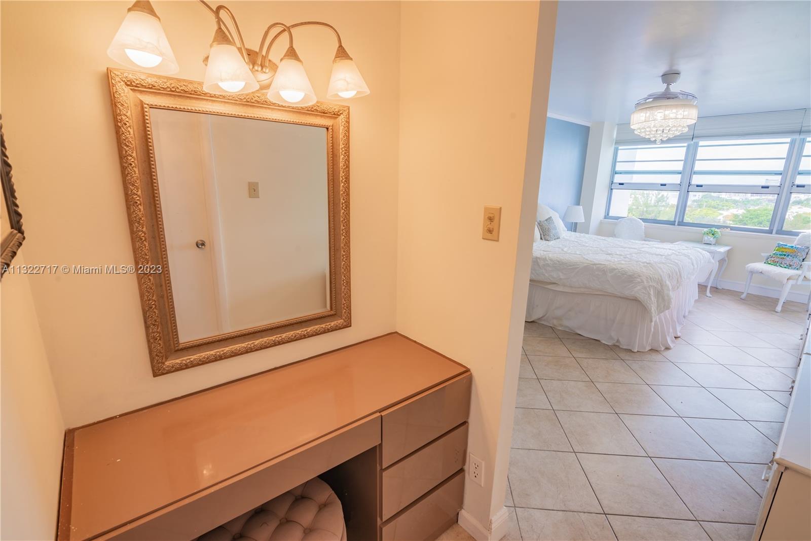 Showing Master bedroom from vanity area.