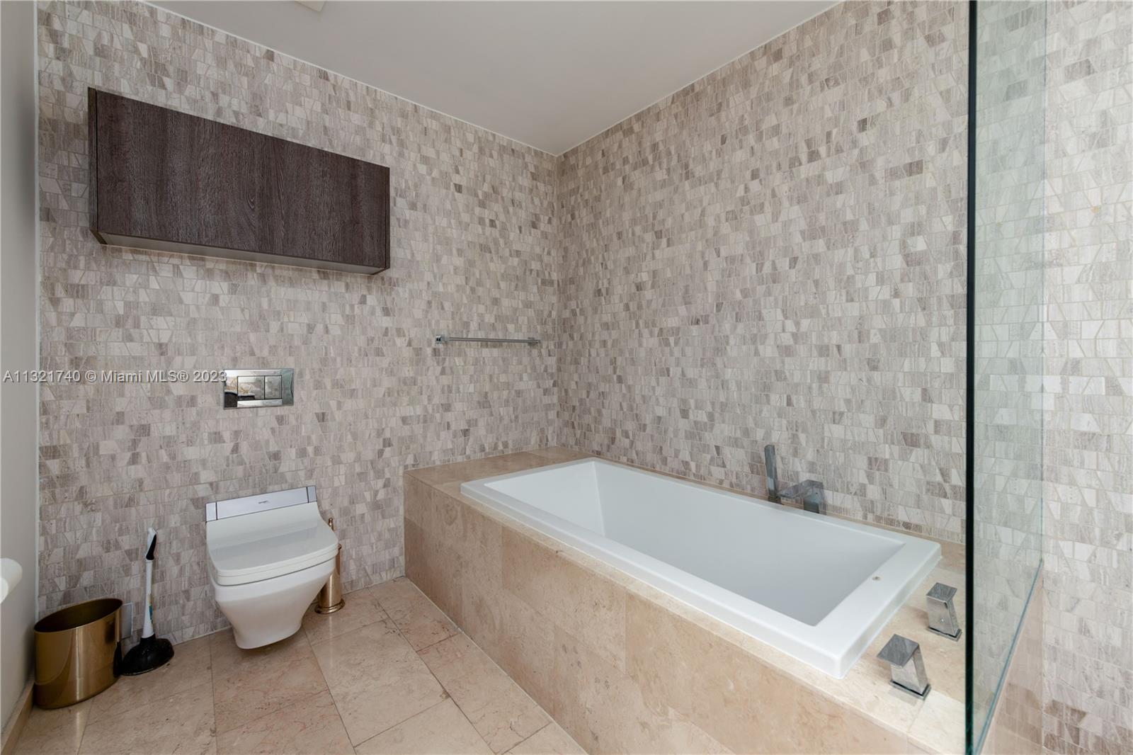 Primary bathroom showing bathtub