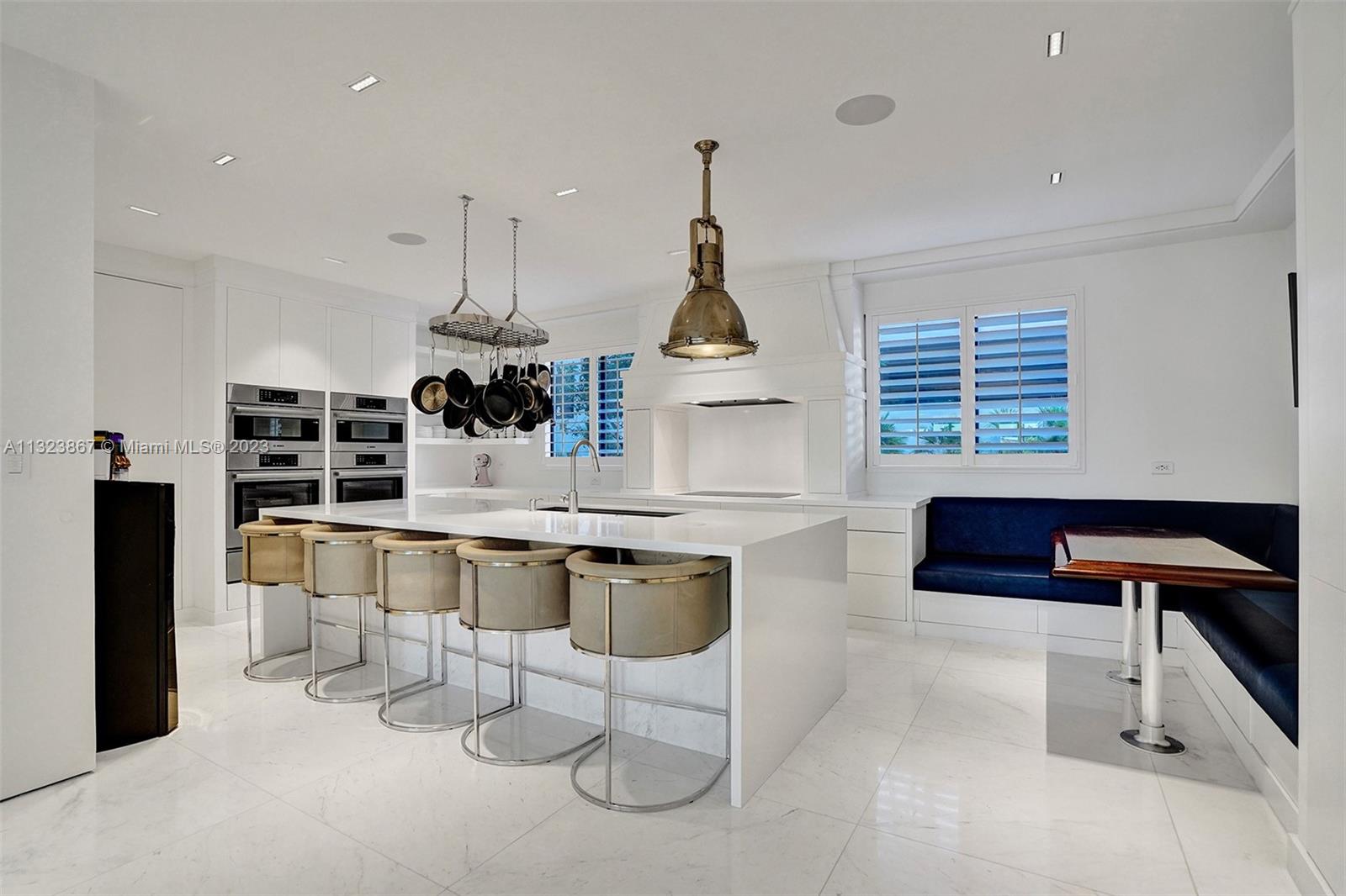 waterfall vanities in kitchen, push and soft close drawers throughout all cabinet work