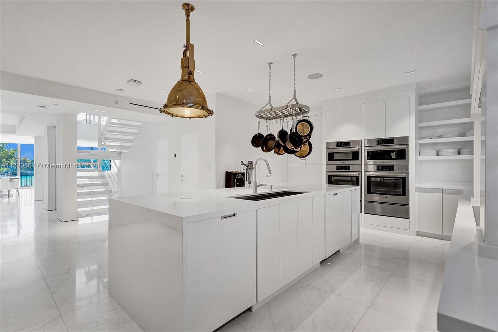 waterfall vanities in kitchen, push and soft close drawers throughout all cabinet work