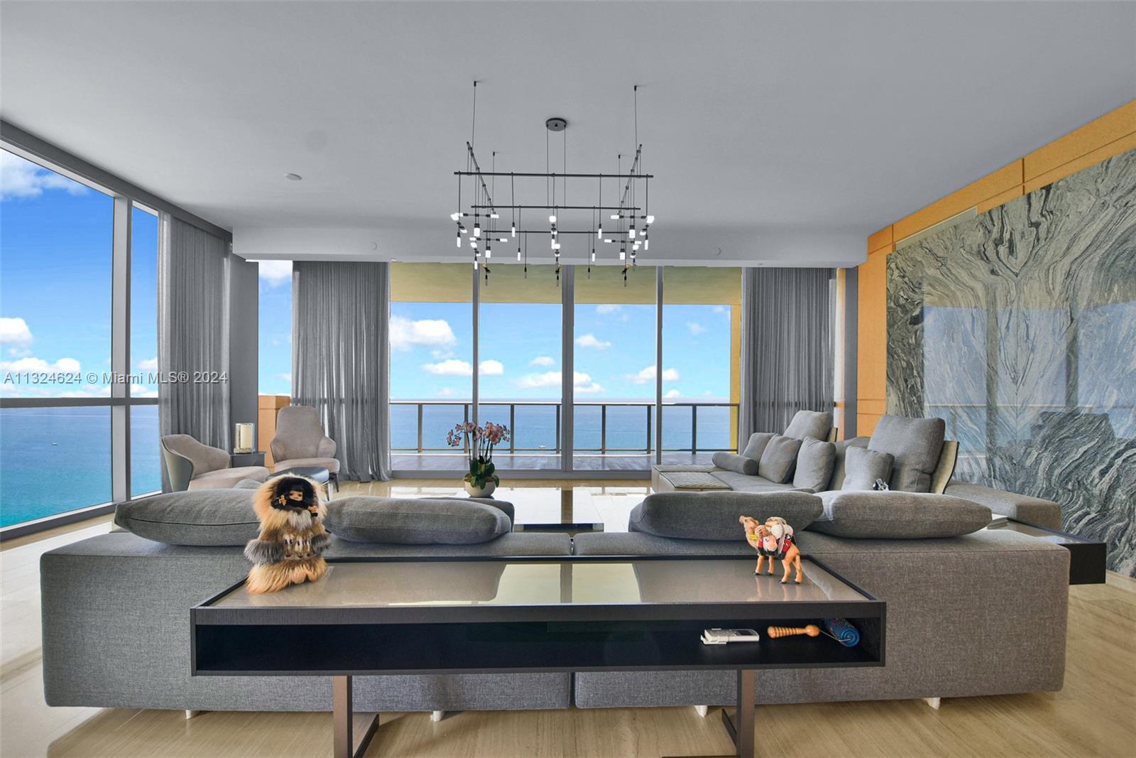 Luxurious one of a kind 3 bed / 6.5 bath 4,609 sf home with direct Ocean and Intercostal views. This magnificent residence has been crafted with the finest of details. Professionally designed and decorated by Phillip Jeffries with most high-end finishes by Minotti. Marble & Wooden Floors, Ornare leather-clad closets, Downsvie with kitchen Miele appliances, fireplace, Jacuzzi and summer kitchen on the south terrace. Rolls Royce house car, cigar/wine lounge, theatre, spa, hammam, kid’s room, golf simulator, breakfast served daily, private beach club, 2 pools, mansion grill with room service. Access to Acqualina 5 star hotel services, ESPA, Il Molino restaurant.