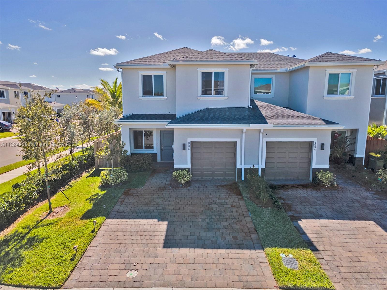 Highly sought after 3/2.5 Twin Home built in 2020 located in Avella Park. HOA only $90. Property is in excellent condition, all bedrooms located upstairs. 1/2 bath downstairs. Open concept floor plan with quartz kitchen countertops, stainless steel appliances including island and counter. Spacious bedrooms and closets with lots of natural light. Laundry upstairs. Master includes walk in closet, dual sinks, separate tub and shower. Parking includes a 1 car garage and paved driveway. Fenced yard. Close to shops, schools and major highways, minutes to Key Largo. Very beautiful, well maintained famiy oriented community.