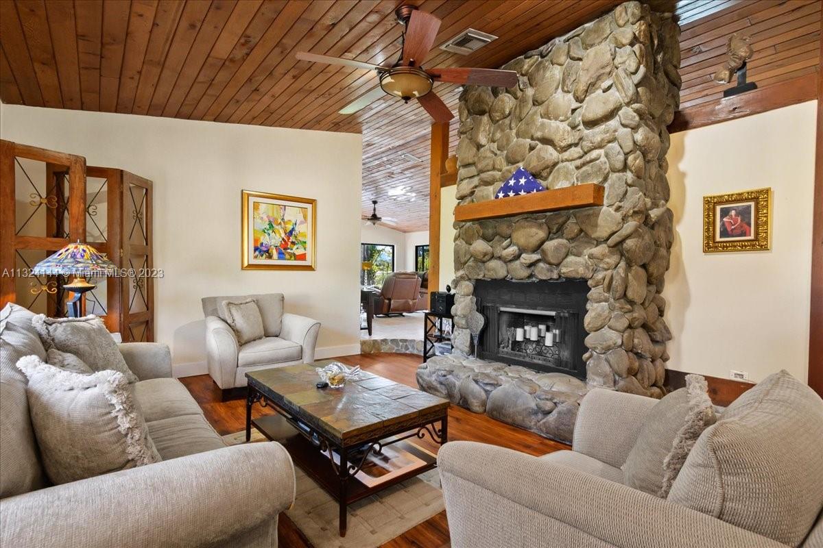 Living Room with River Rock Fireplace