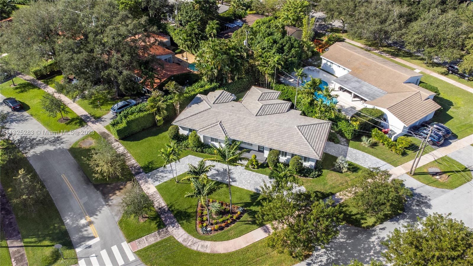 Every detail has been considered in this exceptional Coral Gables corner lot home. The current owners have upgraded multiple facets to present the home in true turnkey condition. Upgrades include: remodeled kitchen with custom pantry; new, relocated septic tank; full impact windows and garage door; custom window tinting; new landscaping; custom electronic awnings; new AC; new gutters; fresh interior and exterior paint; custom closets and wall papering; remodeled primary suite bath. The home flows beautifully through the distinct living areas to the curated backyard that provides supreme privacy and space for lounging and grilling. With sensational curb appeal and equidistant to both the Biltmore and Merrick Park, 5130 Donatello stands above the competition.