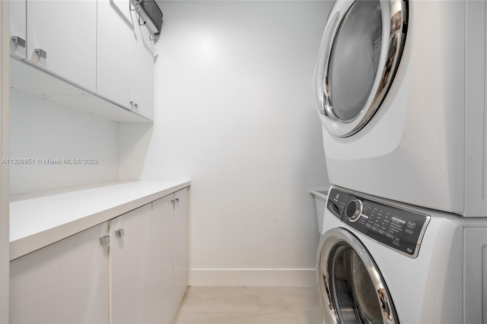 Located on the second floor | Electrolux Washer /Dryer | Lots of Cabinetry built-ins | Sink