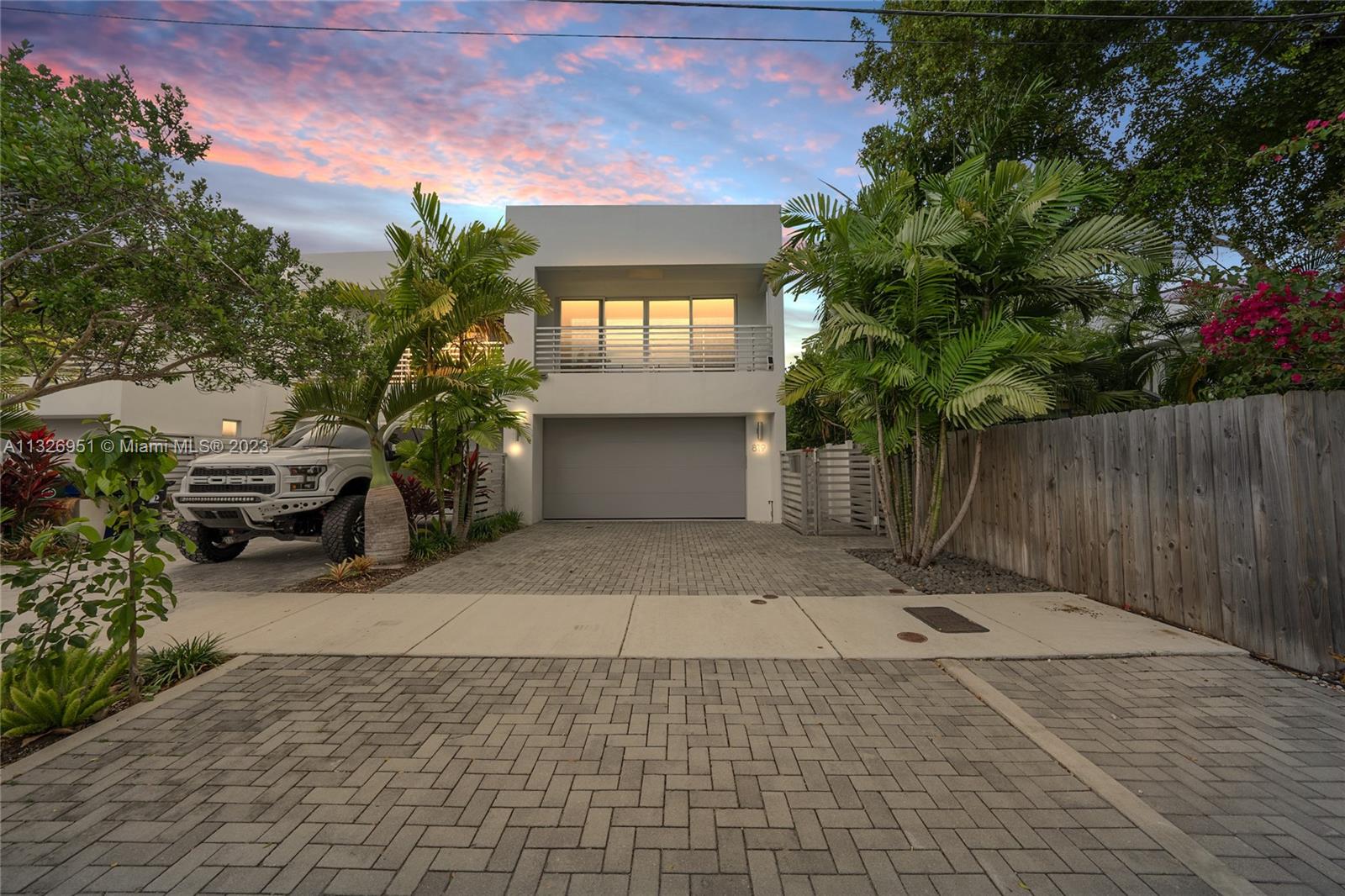 Twilight Front View | Expansive Drive Way | 2 Car Garage + 4 Drive Way Parking Spaces