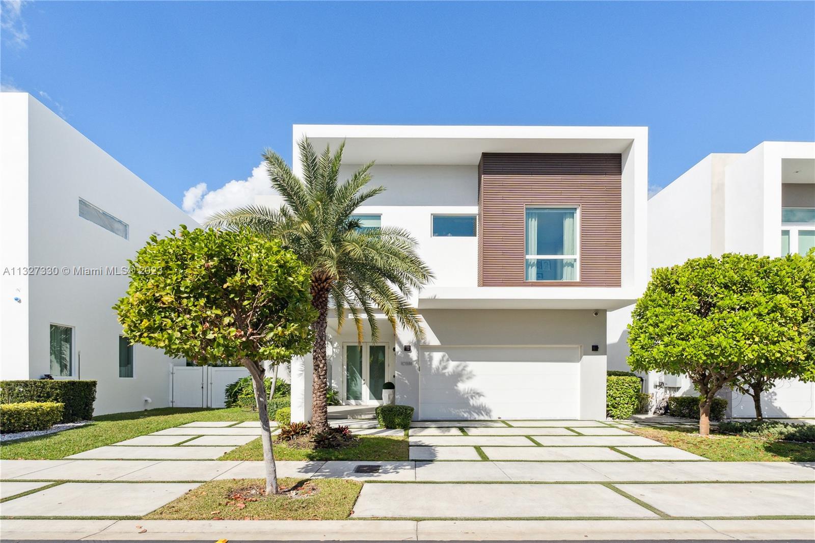 A one-of-a-kind prestigious house, located in the most coveted and exclusive gated community in Doral, The Mansions. This house features 5 bedrooms, 4 full bathrooms and 1 1/2 bathrooms, with a bedroom and full bath on the first floor. This spectacular property is a smart home, and high-impact windows and doors. Subzero and Wolf appliances, top-of-the-line cabinetry and quartz countertops, electric shades, and California closets in all rooms, with interior, and exterior audio systems. Covered Terrace, built-in-outside kitchen with grill and mini freezer. Appointments only with 24-hour notice, please text the Listing Agent.