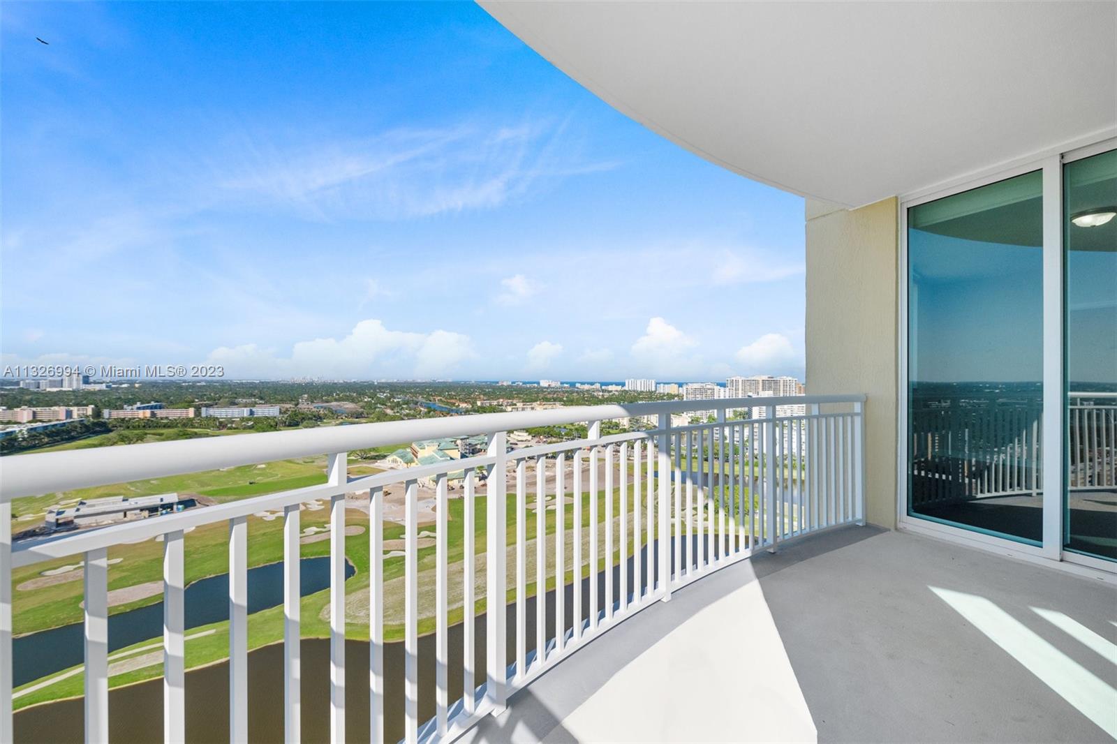 Wow! Golf course, lake & Ocean Views. Golf Course under Greg Norman renovation. Wrap Around Balcony