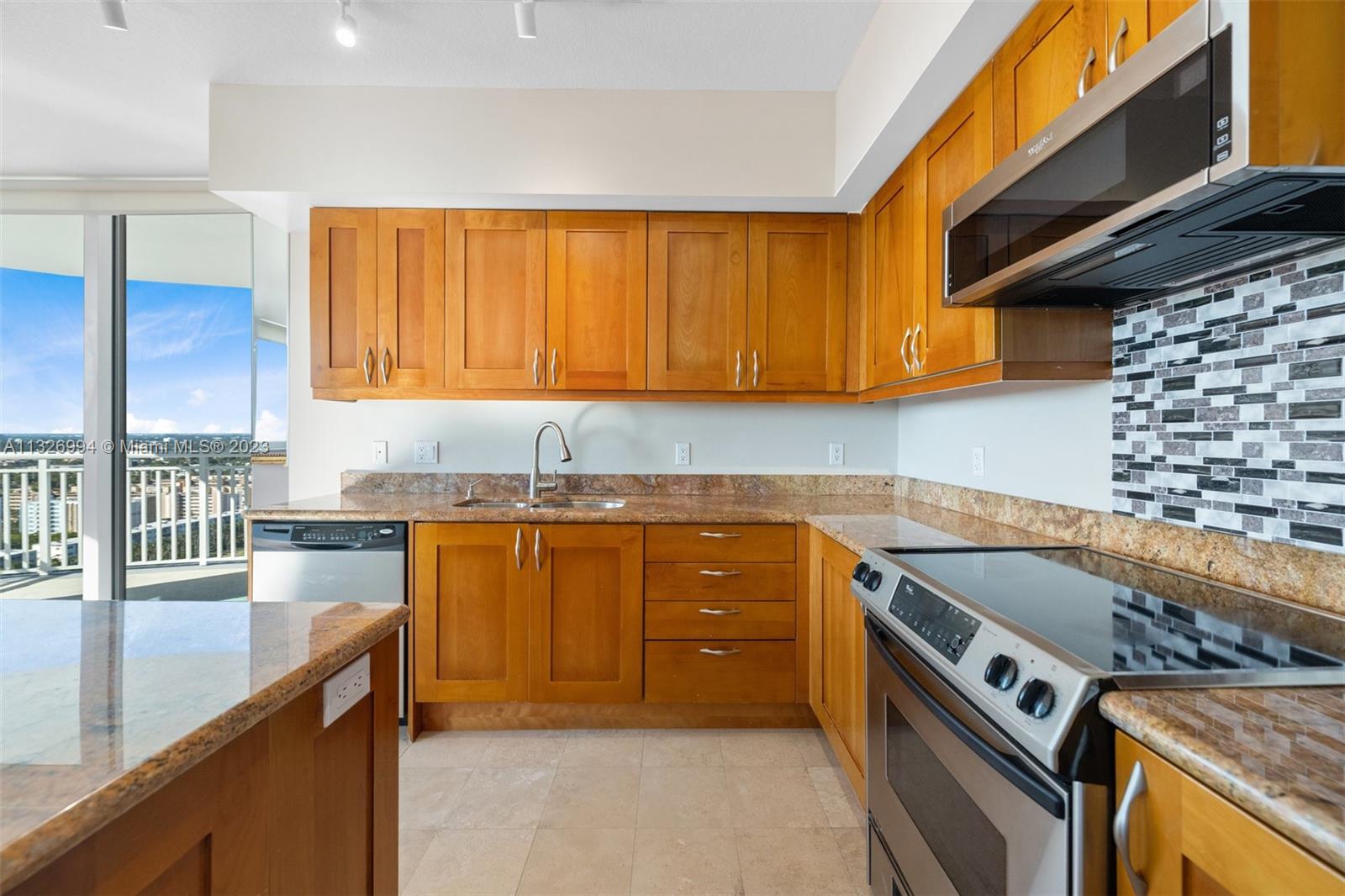 Fully equipped kitchen with super cool backsplash